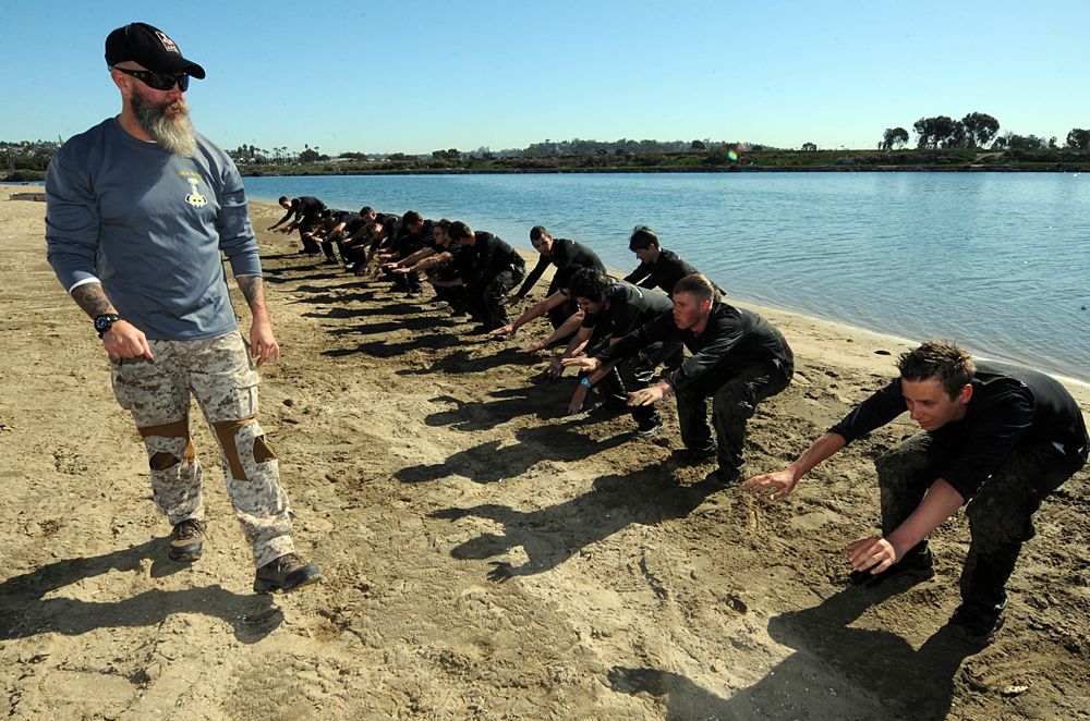 Team Novo Nordisk work on their team cohesion with former US Navy SEALs