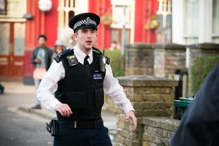 Callum Highway faces an attacker in EastEnders
