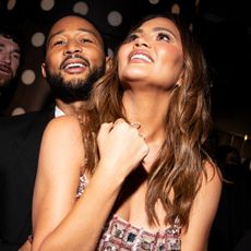 John Legend and Chrissy Teigen at the Sports Illustrated Swim Issue Launch Party held at the Hard Rock Hotel on May 16, 2024 in New York City.