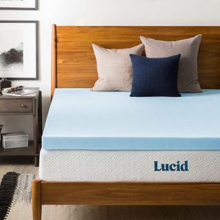 Lucid Mattress Topper on a bed.