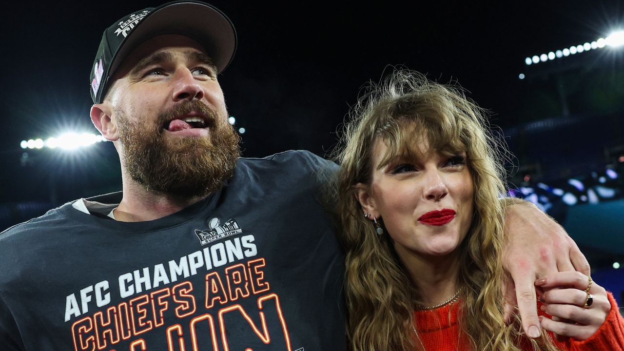 ravis Kelce #87 of the Kansas City Chiefs (L) celebrates with Taylor Swift after defeating the Baltimore Ravens in the AFC Championship Game at M&amp;T Bank Stadium on January 28, 2024 in Baltimore, Maryland.