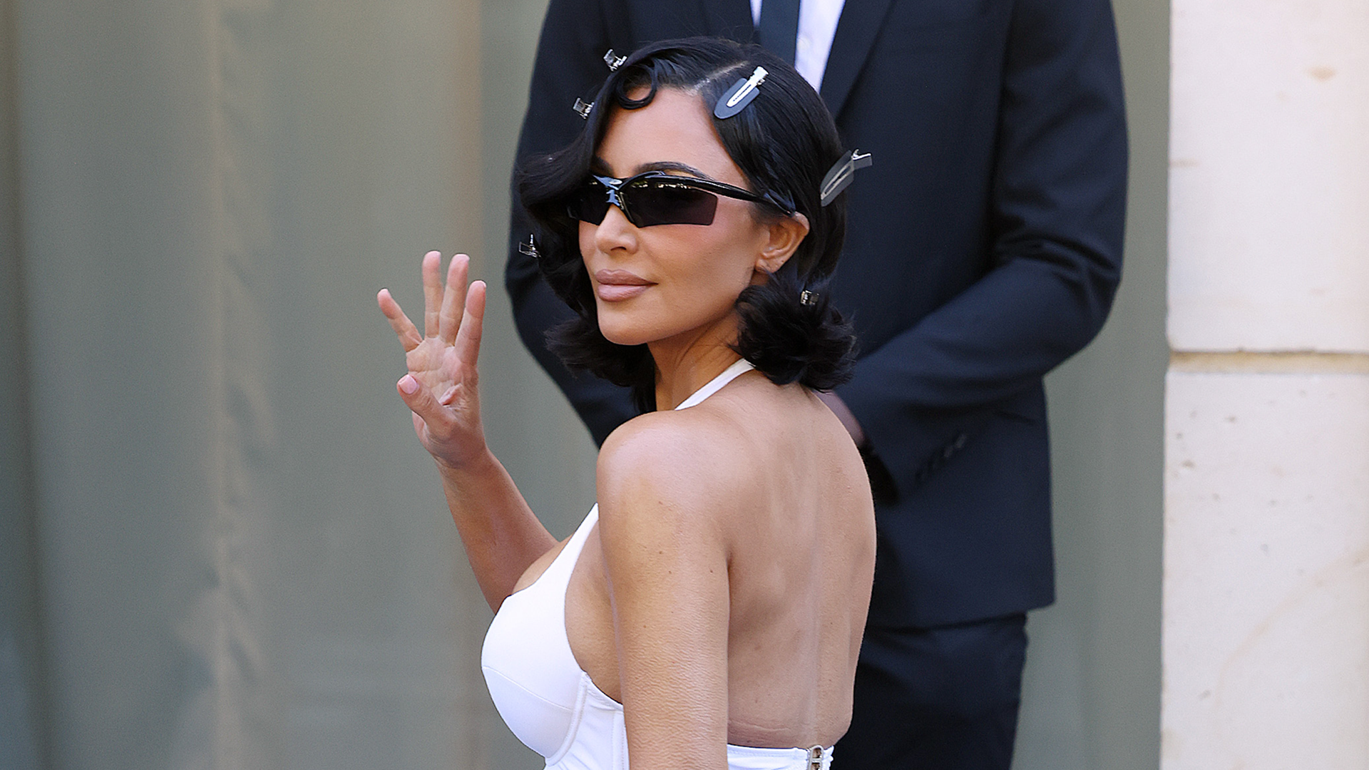 Kim Kardashian walked the Balenciaga Couture Week runway in a skin-tight lingerie dress and a fur coat