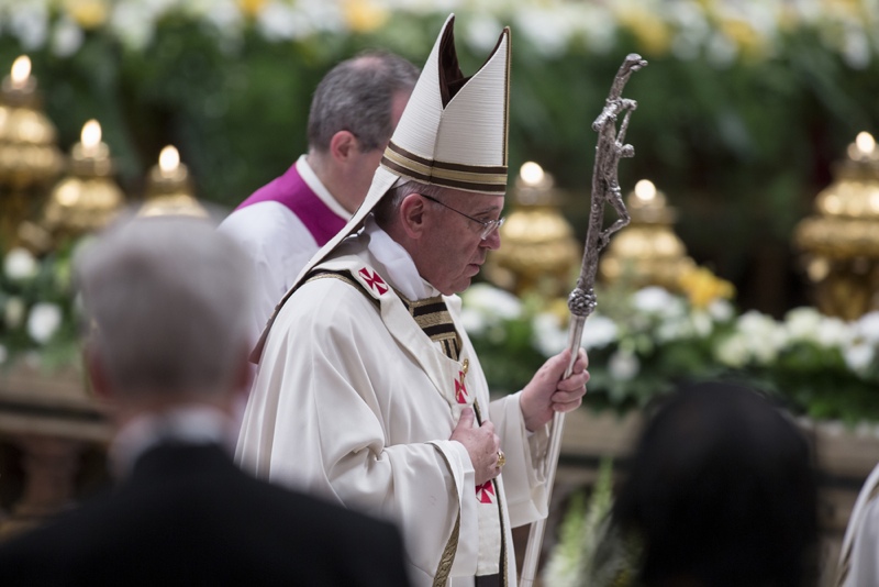 Pope Francis leads the Easter vigil mass in Saint Peter's Basilica on Holy Saturday. Vatican City, 19 April 2014.