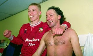 Wrexham goalscorers Steve Watkin and Mickey Thomas celebrate after their FA Cup win over Arsenal in January 1992.
