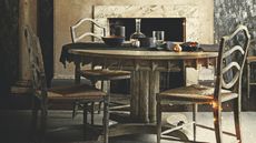 Rustic dining room with string lights and black ceramics