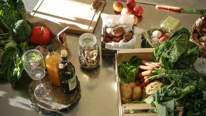 Fruit and vegetables displayed on a kitchen counter