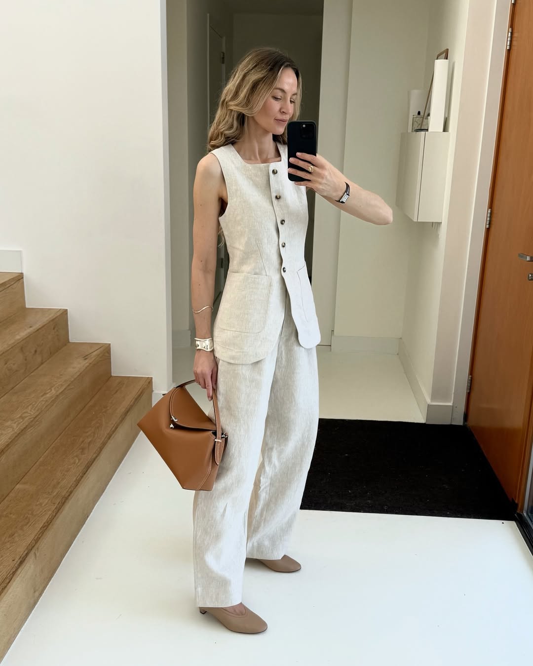 Woman in linen pants set.