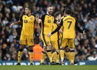 Tom Pope drew Port Vale level at the Etihad