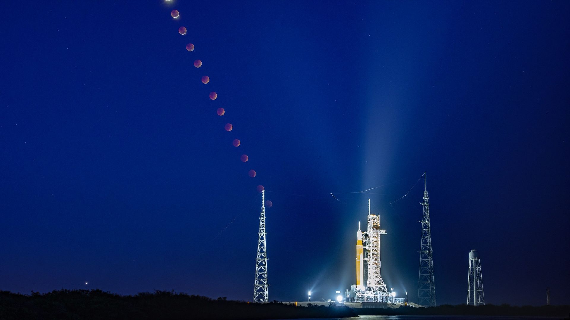 Blood Moon rises over Artemis 1 megarocket preparing for launch in
