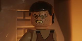 A close-up of a Lego version of one of Los Ganados from RE4.
