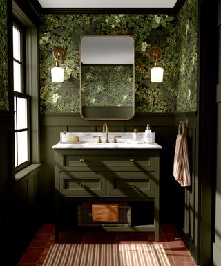 green bathroom with green botanical wallpaper