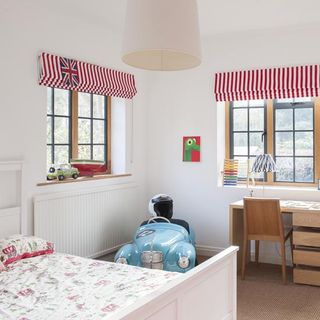 boy's bedroom with red and white striped blinds