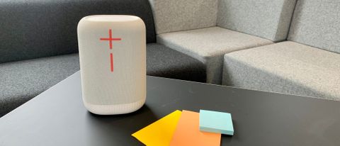 UE Epicboom speaker on a table by some post-it notes