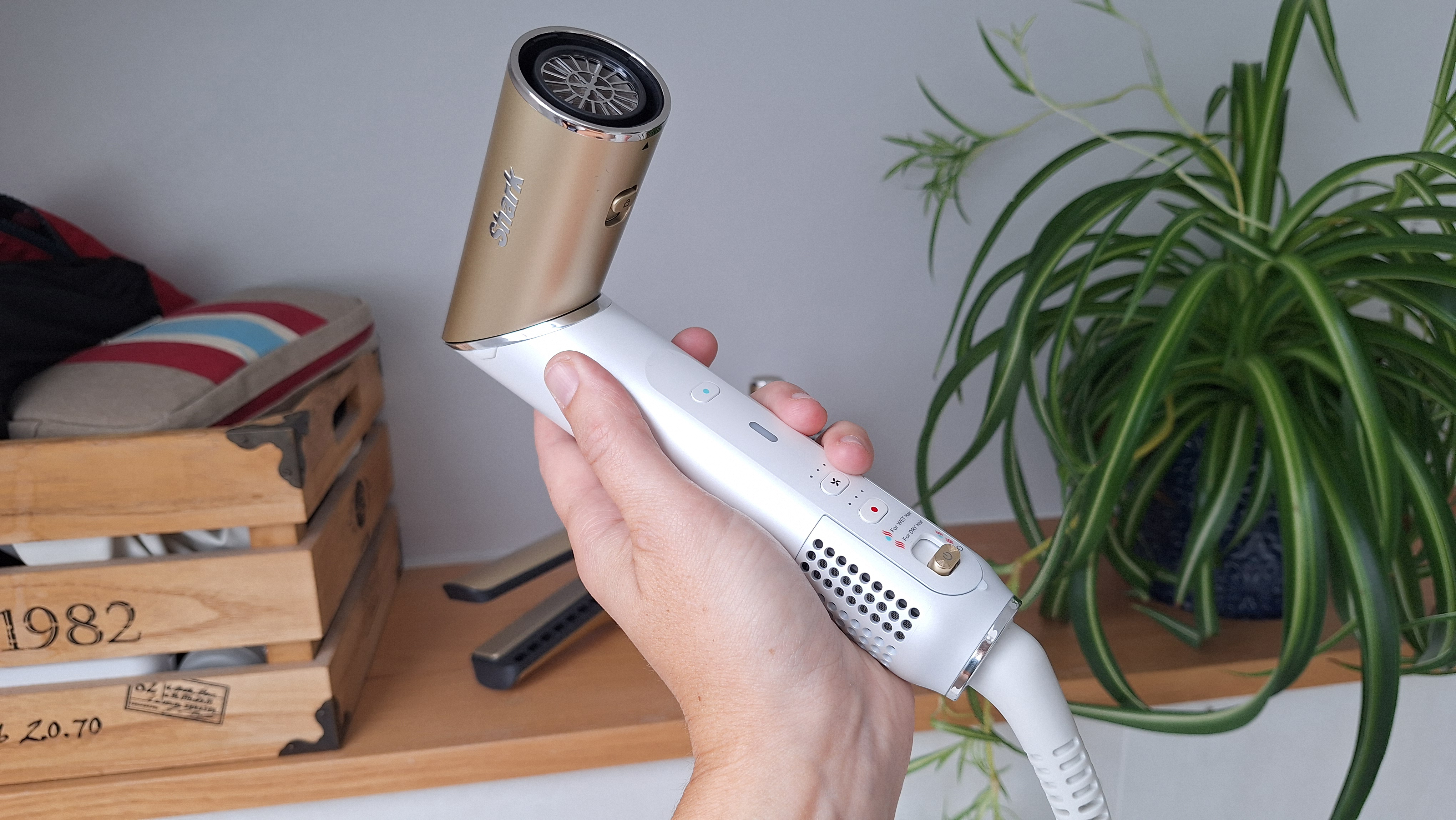 Shark Glam Multi-Styler tool twisted into hair dryer mode