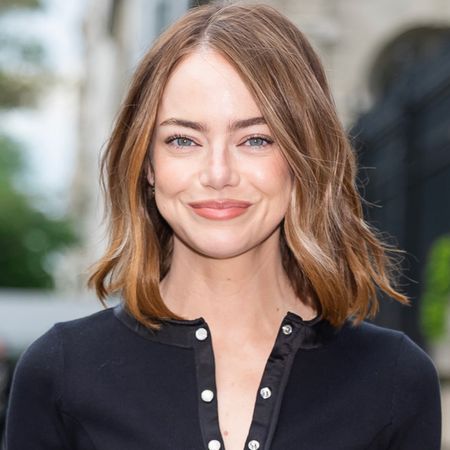 Emma Stone attended the Louis Vuitton Cruise 2027 show in a cozy cardigan set