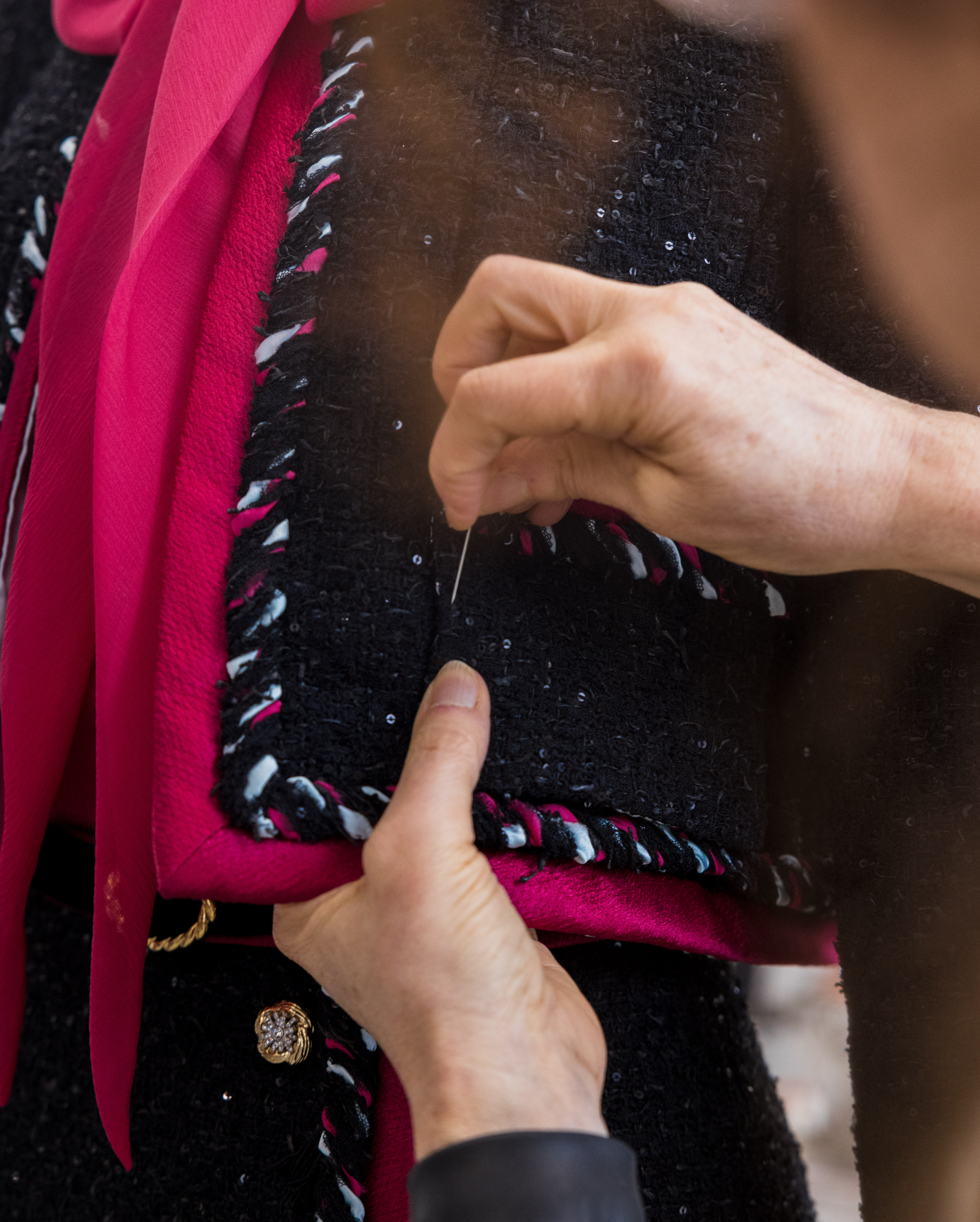 a garment worker crafts Whitney Peak's 2025 Met Gala look in the atelier