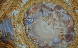 Image of ceiling detail in the Palatina Gallery of the Palazzo Pitti.