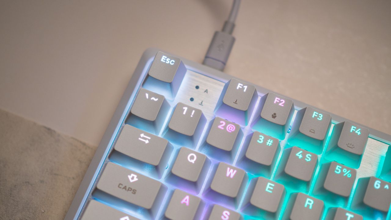 Corsair K70 Pro TKL close view of keys with RGB light shining through