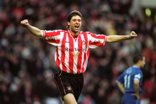 Niall Quinn celebrates after scoring for Sunderland against Chelsea, 1999