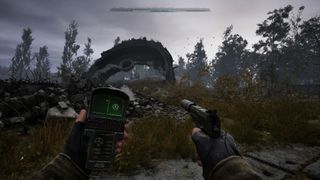 Holding a silenced pistol and an anomaly scanner in Stalker 2: Heart of Chornobyl, while a concrete arch floats mysteriously in the distance