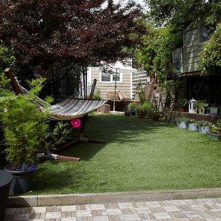 artifical grass with hammock and plants