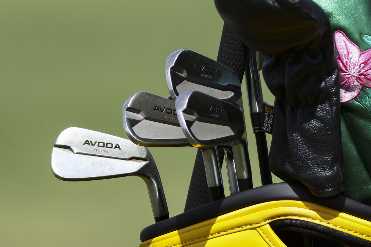 A detailed view of the golf clubs used by Jason Day as he practices on the putting green prior to the Texas Children's Houston Open