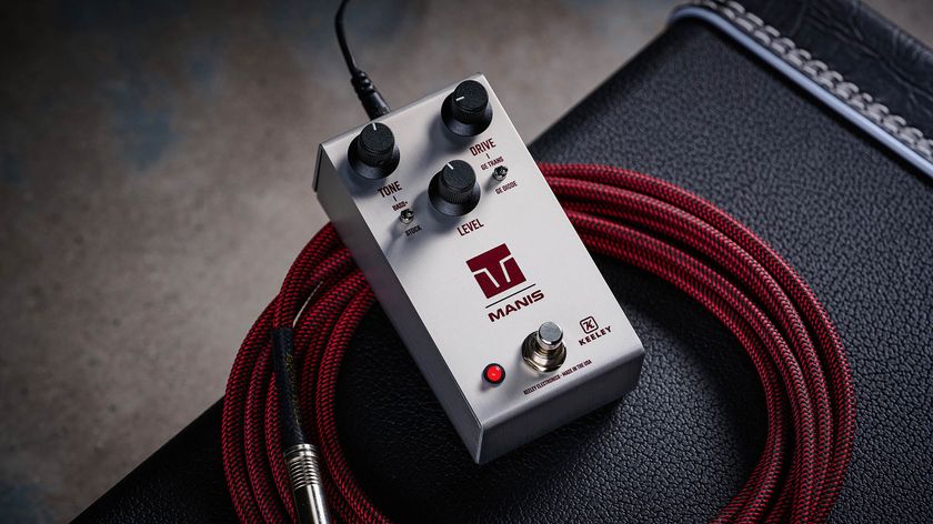 Keeley Electronics Manis: this ingenuous twist ont he K-style overdrive has three-knobs, a couple of mode switches, a tidy white finish and is photographed here against an amp with a red guitar cable.
