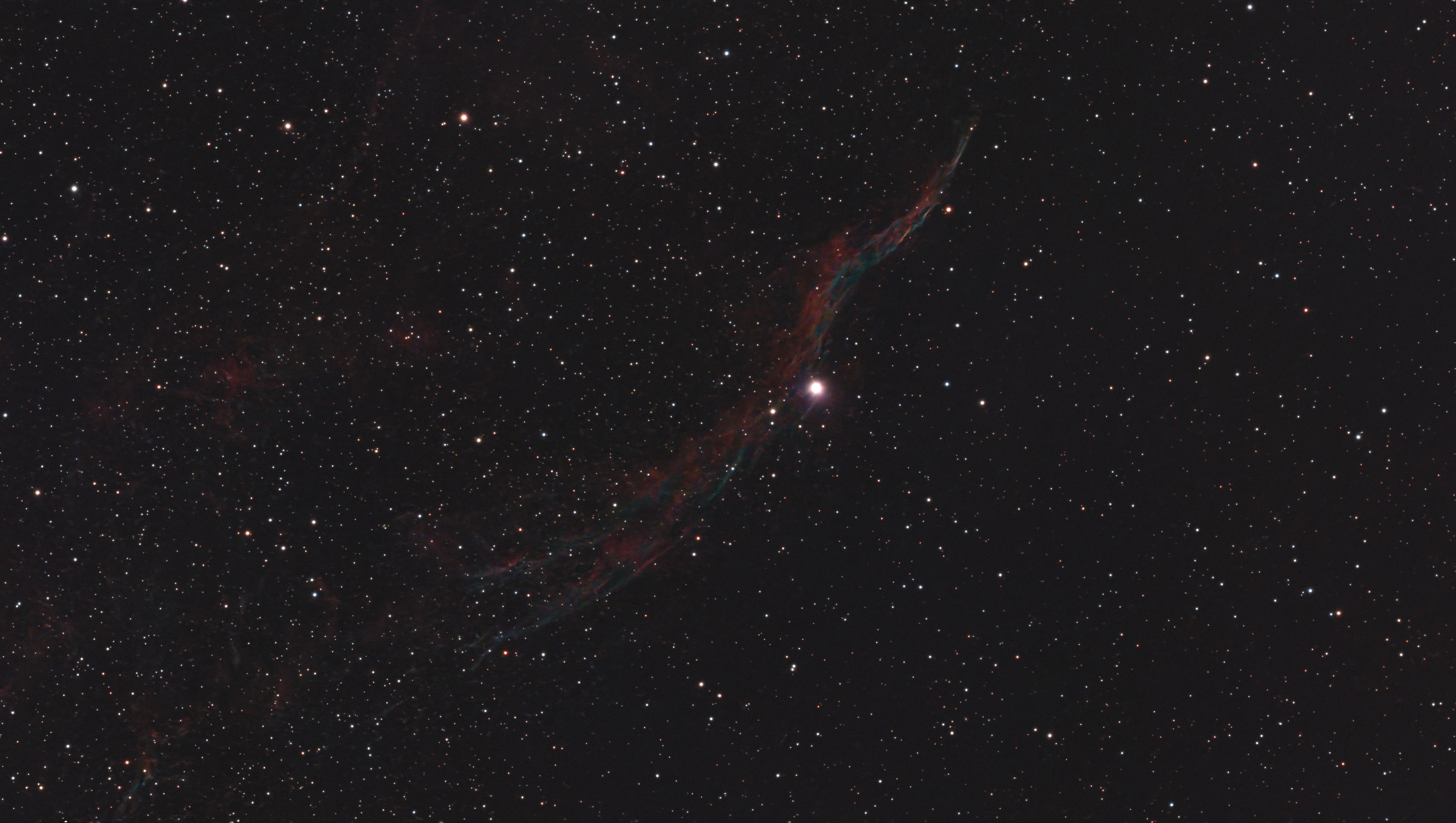 A photograph of the West Veil Nebula, taken with the Dwarf III smart telescope, processed in Pixinsight