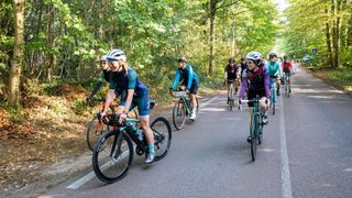 Rapha Womens 100 group riding on a peaceful closed road