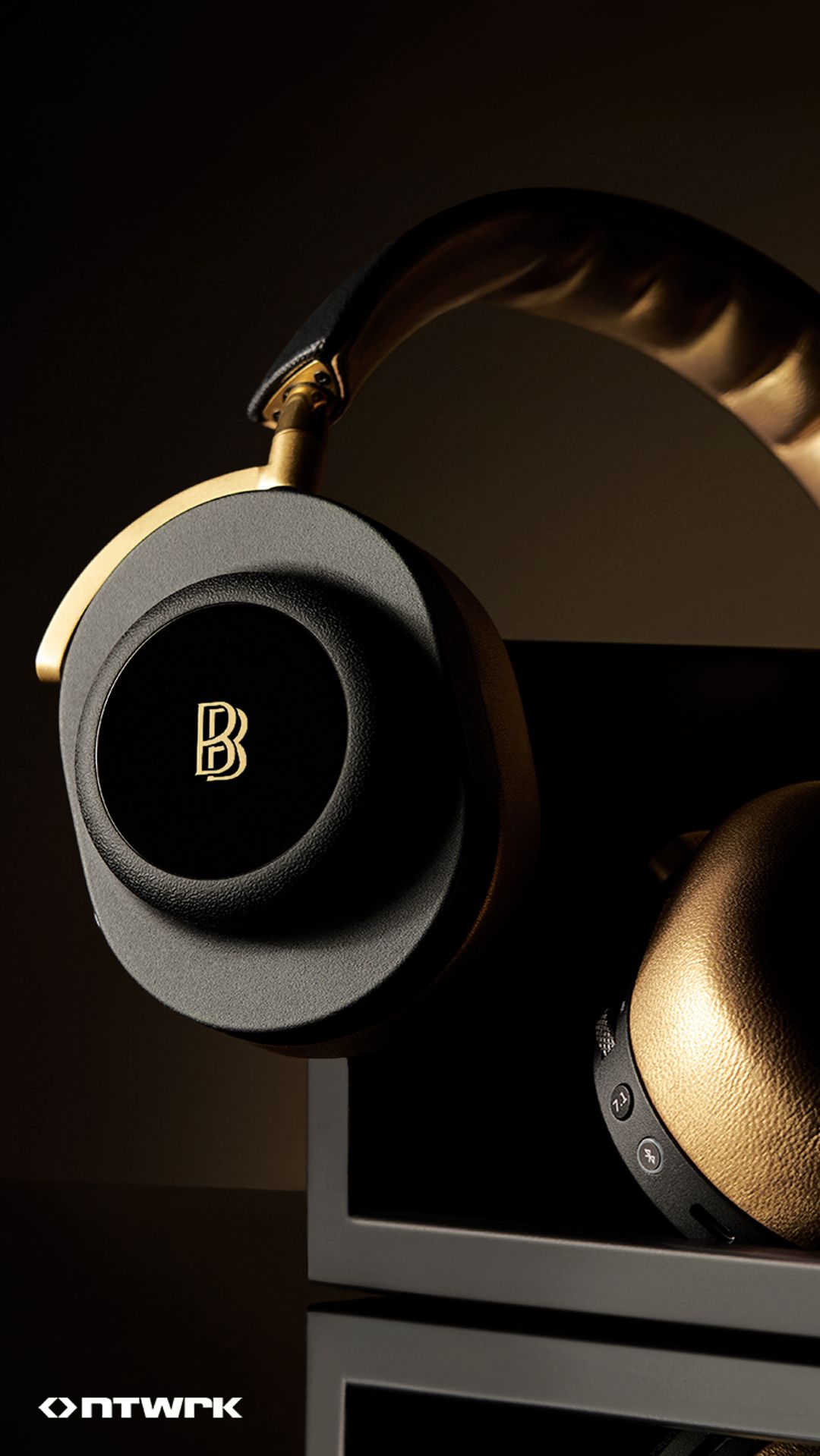 A vertical shot of the Master &amp; Dynamic MG20 Wireless Gaming Headphones.