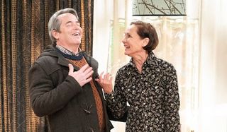 jackie and peter laughing on the conners