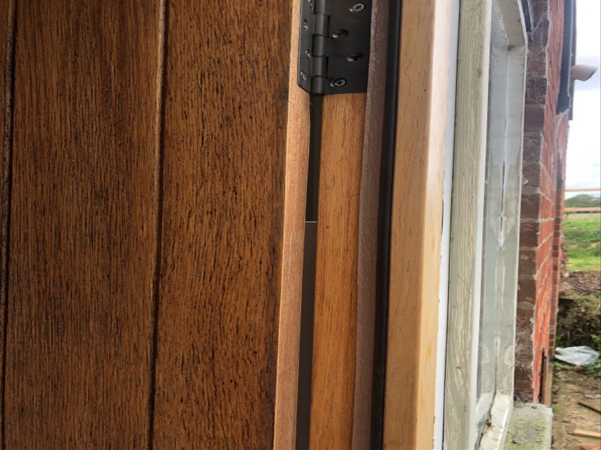 The foam tape affixed to the door frame