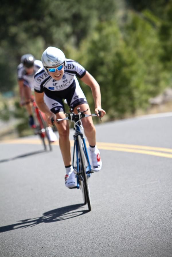 A Tibco rider powers over a climb
