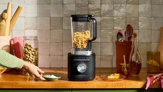 The KitchenAid Pure Power Blender sits on a kitchen countertop