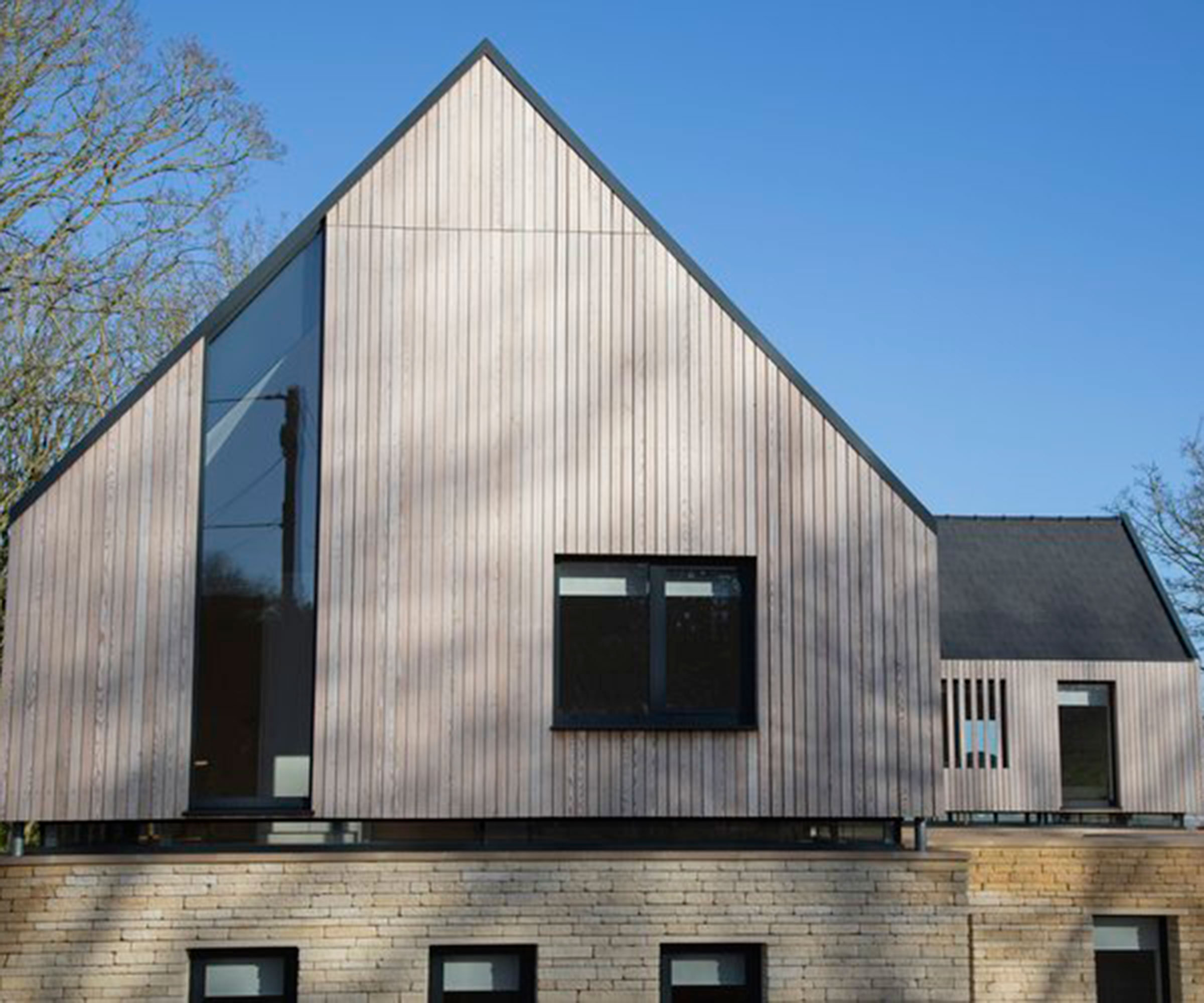Contemporary home with modern aluminium glazing and timber cladding