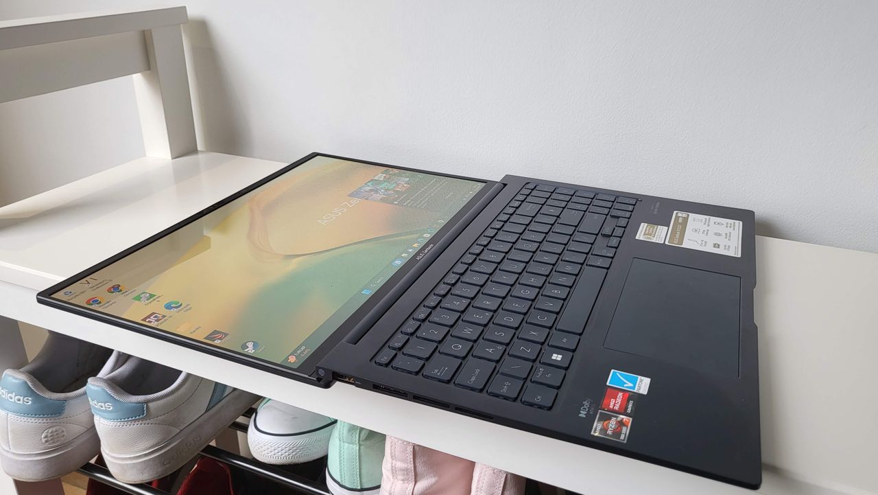 Asus Zenbook OLED 15 (2023) on a shelf