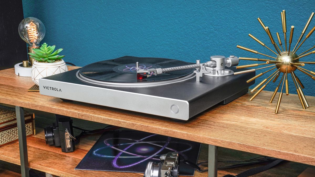 Victrola Hi-Res Carbon turntable on a hi-fi stand in a hi-fi room