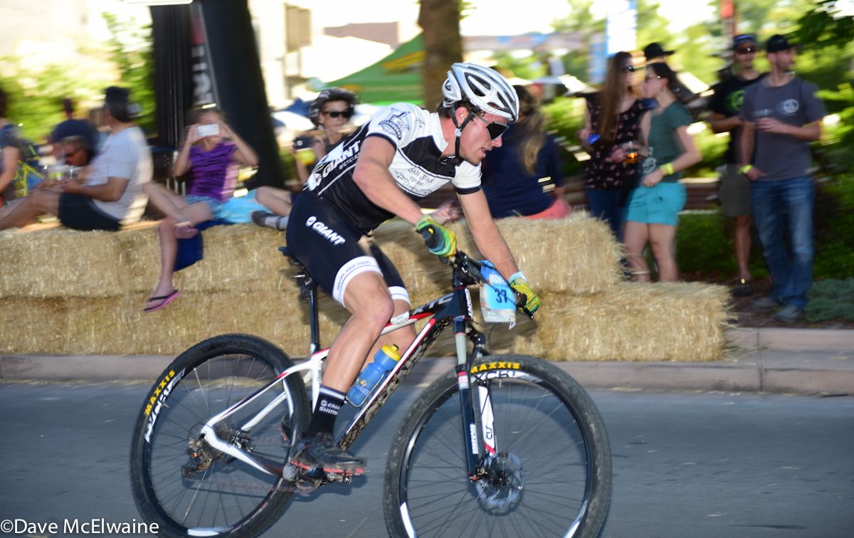 A Giant rider comes through the start-finish on lap three