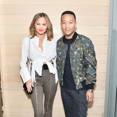 los angeles, ca august 10 chrissy teigen and john legend attend intermix x alc on duty launch dinner with chrissy teigen at jon and vinnys on august 10, 2017 in los angeles, californi photo by stefanie keenangetty images for intermix x alc