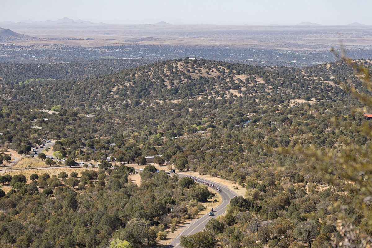 At just over 1km to go to the top of the first KOM, the climbers took to the front stringing out the field in the search for Polka-points.