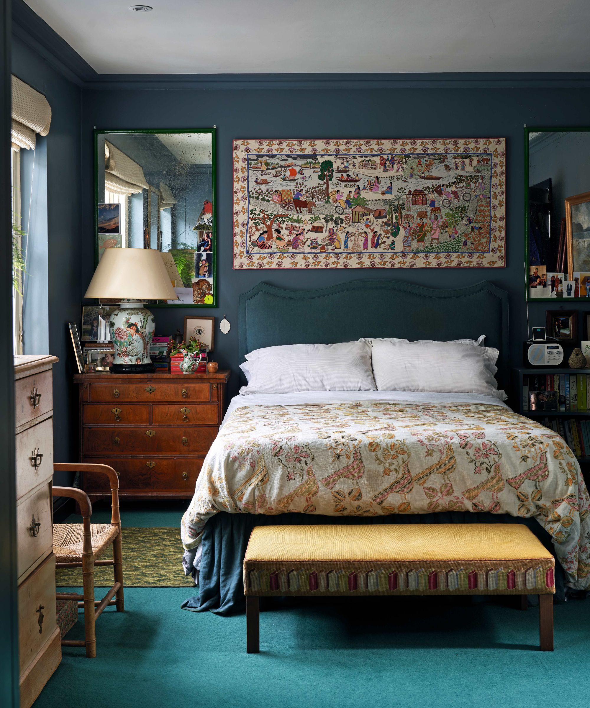 Dark blue bedroom with blue carpet