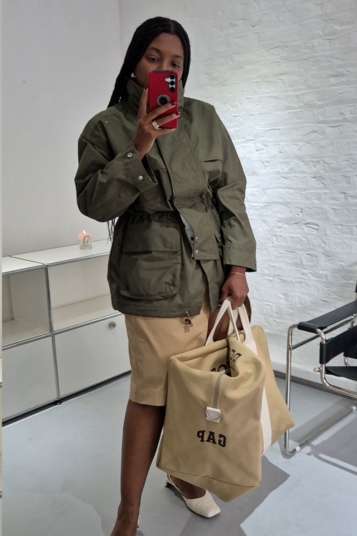 Remy wearing GAP funnel-neck jacket