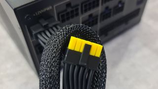 MSI power supply 12VHPWR cable with yellow colouring.
