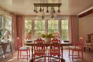 Dining room with a statement pendant light fitting over the dining table
