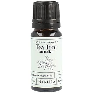 Nikura Pure Australian Tea Tree Essential Oil for Skin, Nail Fungus, Face, Hair, Acne, Piercings, Head Lice | Diffuser Oil for Home, Candle & Soap Making | 10ml | Vegan & Uk Made