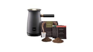 Hotel Chocolat Velvetiser review: small appliance with hot chocolate sachets on a white background