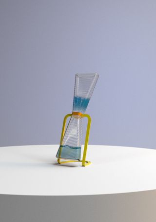 The Self-regenerating water-based lamp has a yellow stand made out of metal, with an hourglass-like glass structure filled with water.