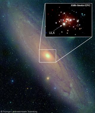 A Hubble Space Telescope optical image of our nearest neighbor galaxy, Andromeda (M31), with an inset X-ray image of the active center made with the XMM-Newton observatory.