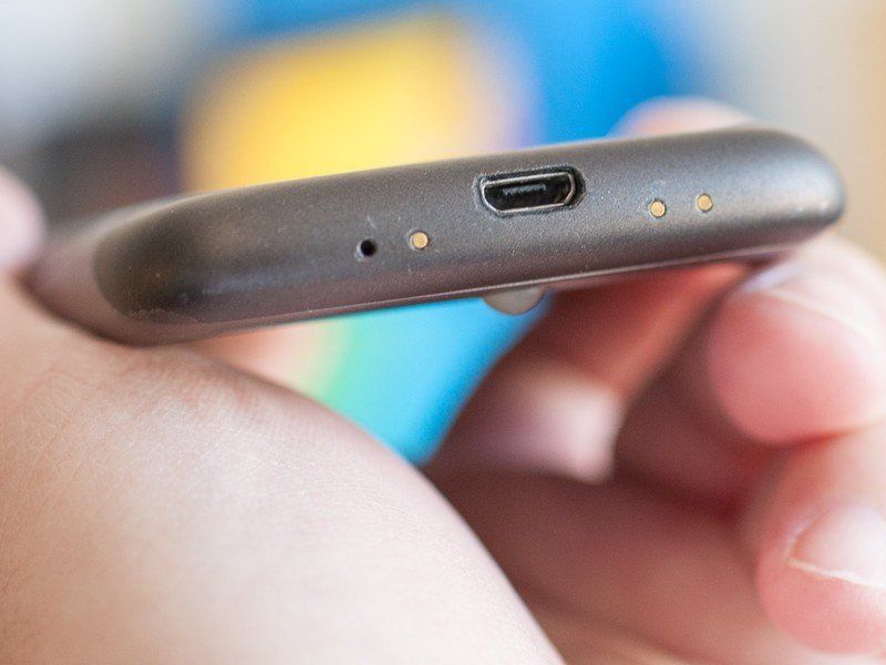 The Nexus One introduced the idea of pogo pins and a sort of wireless charging