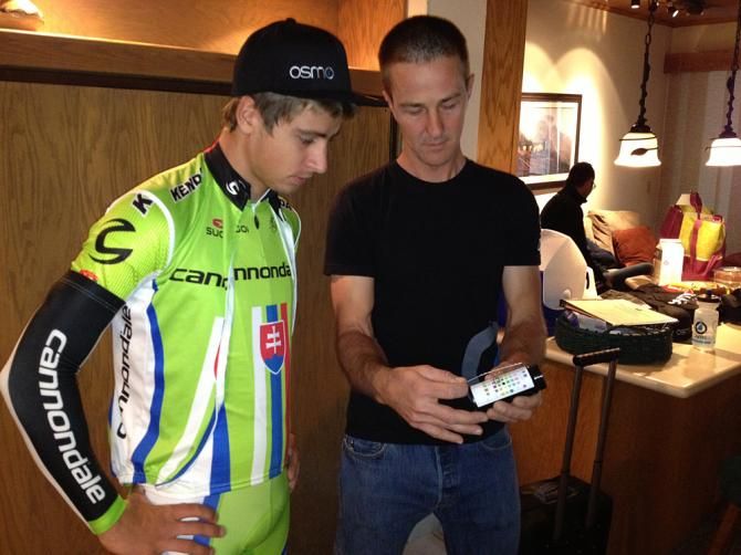 Osmo's Ben Capron measures the specific gravity of Peter Sagan's urine to test his hydration level